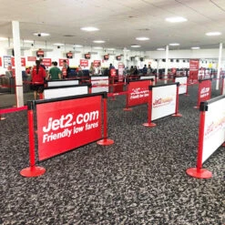 Printed Retractable Queue Barriers RollerSigns -XL Displays Printed Retractable Queue Barriers RollerSigns Indoor PVC Airport Signs